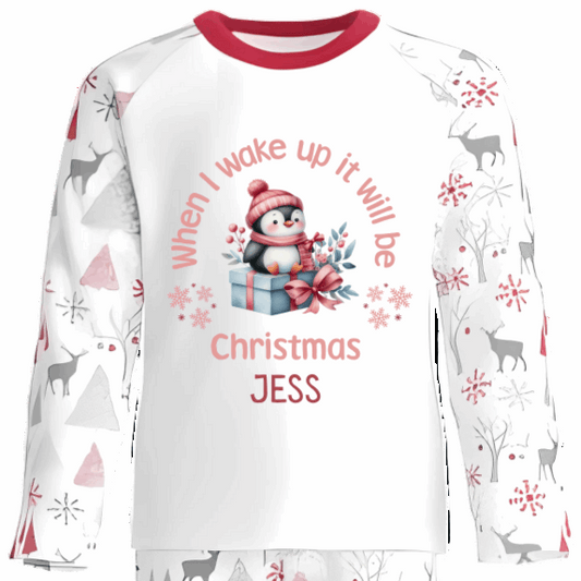 Personalised Kids Christmas Pyjamas with Sitting Penguin and Gift Design