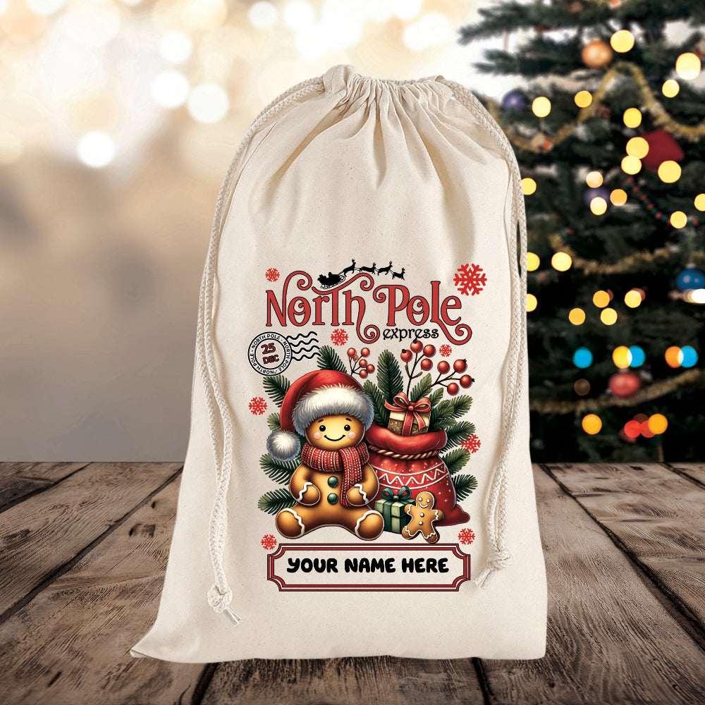 Personalized Christmas gift bag with 'North Pole Express' design on a wooden surface with a blurred Christmas tree in the background.