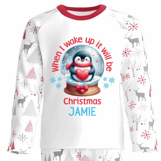 Personalised Kids Christmas Pyjamas with Penguin and Snow Globe Design